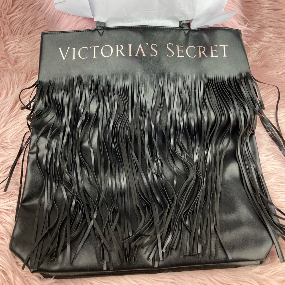 Victoria’s Secret faux leather fringe black bag.